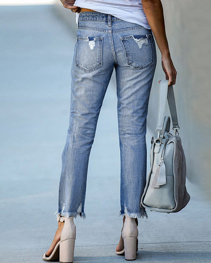 Clara | Jeans ajustats per a dones amb rips i vores desfilades