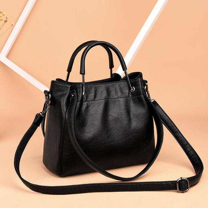 Ella | Bossa de mà de cuir amb un estil retro elegant