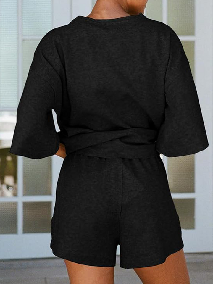 Conjunt de 2 peces amb una samarreta de màniga 3/4 i pantalons curts