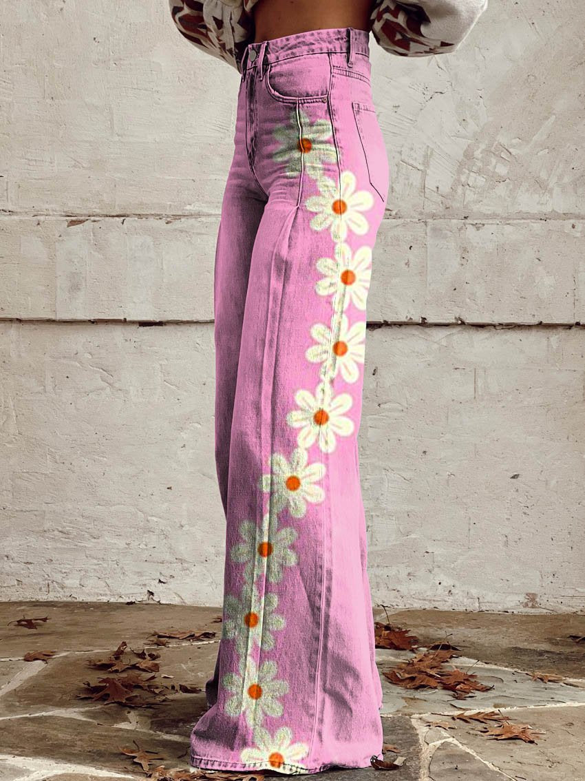 Pantalons de campana de denim rosa amb patró de margarides