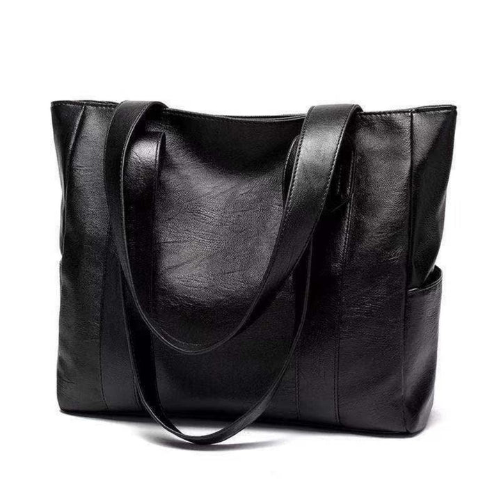 Nova | Elegant bossa de mà de cuir vintage