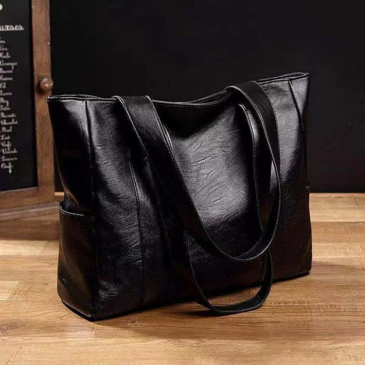 Nova | Elegant bossa de mà de cuir vintage