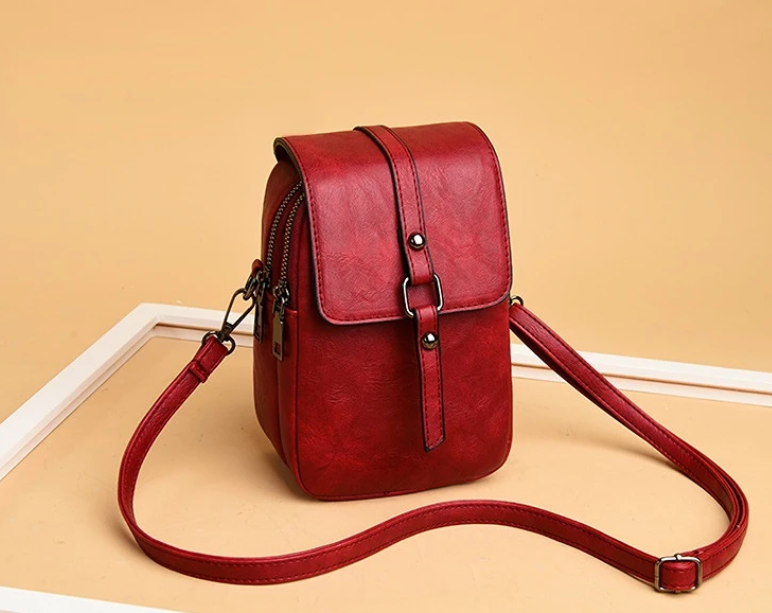 Bossa de mà vintage de cuir suau amb estil