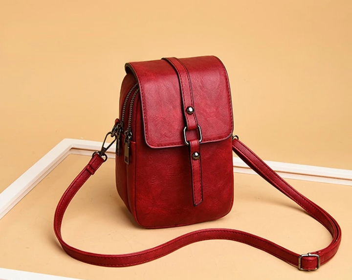 Bossa de mà vintage de cuir suau amb estil