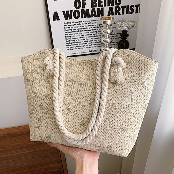 Bossa de cuir amb motius florals