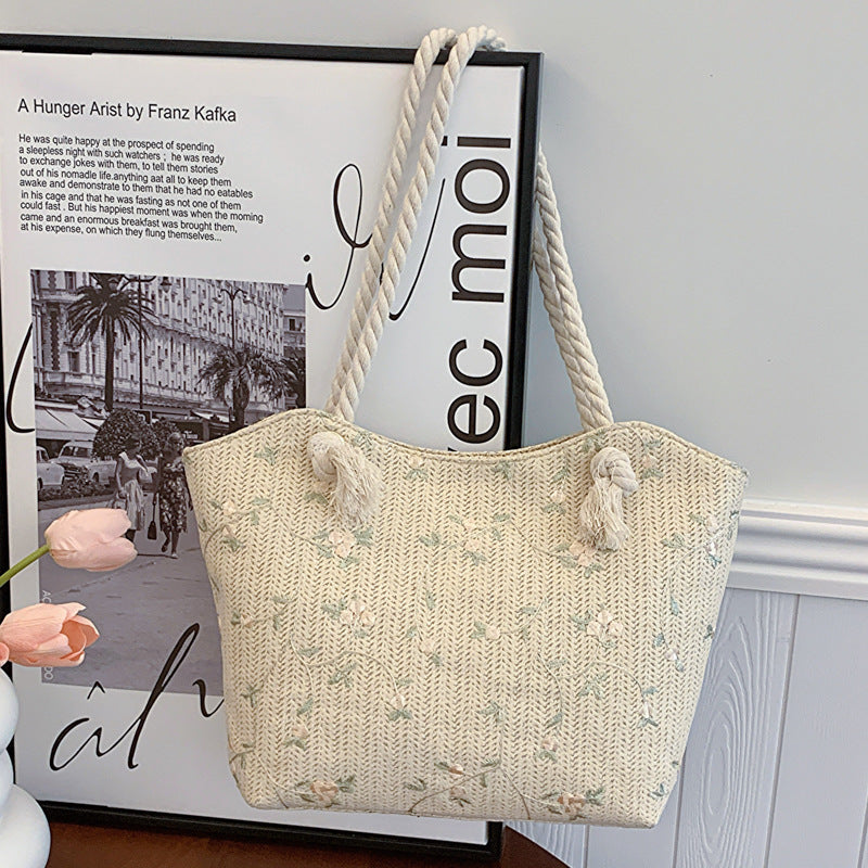 Bossa de cuir amb motius florals