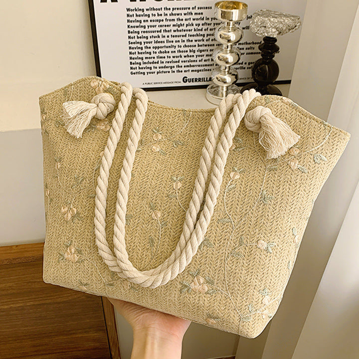 Bossa de cuir amb motius florals