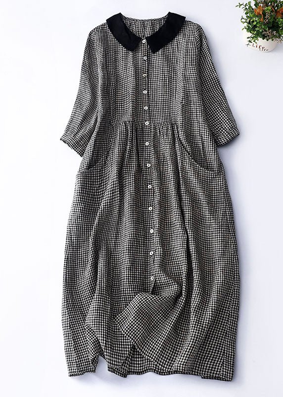 Vestit negre de quadres amb coll Peter Pan
