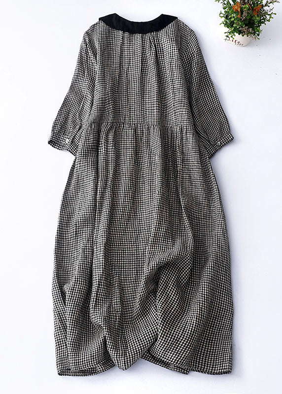 Vestit negre de quadres amb coll Peter Pan