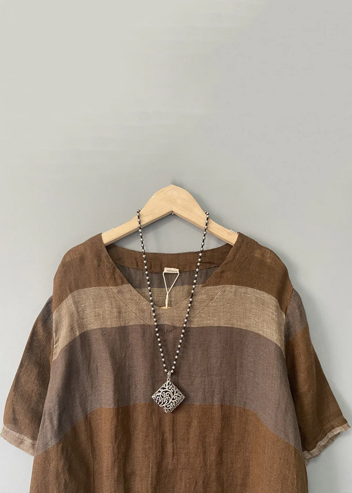 Vestit midi de lli amb escot en V i mànigues curtes
