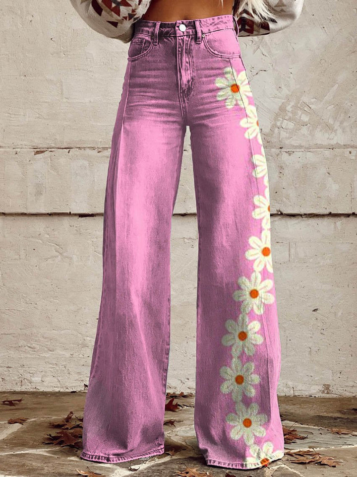 Pantalons de campana de denim rosa amb patró de margarides