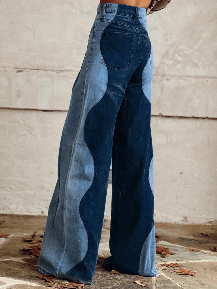 Jeans de patchwork amb cama ampla i patró de ones