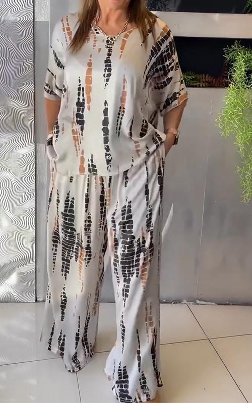 Vestit de satí de dues peces amb escot rodó