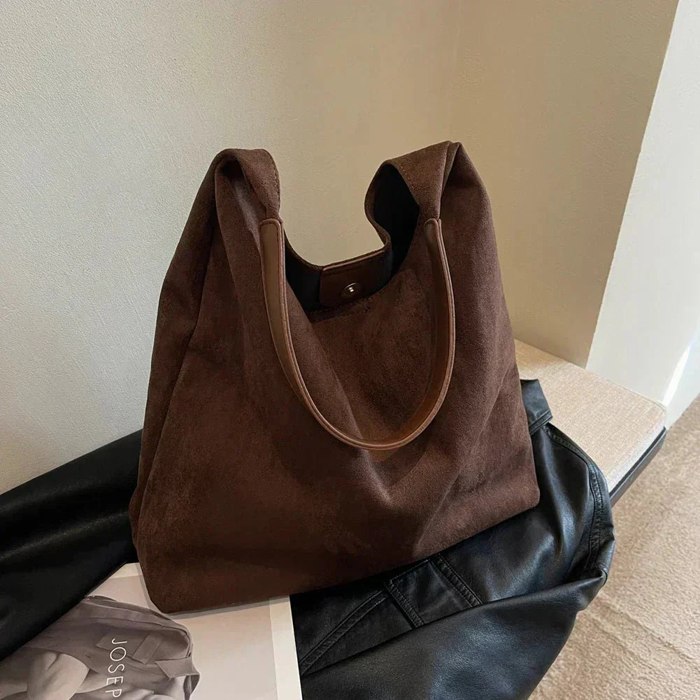 Lila | Bosses de mà elegants – pràctiques i de moda