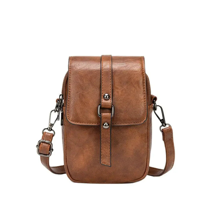 Bossa de mà vintage de cuir suau amb estil