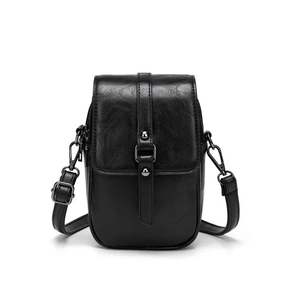 Bossa de mà vintage de cuir suau amb estil