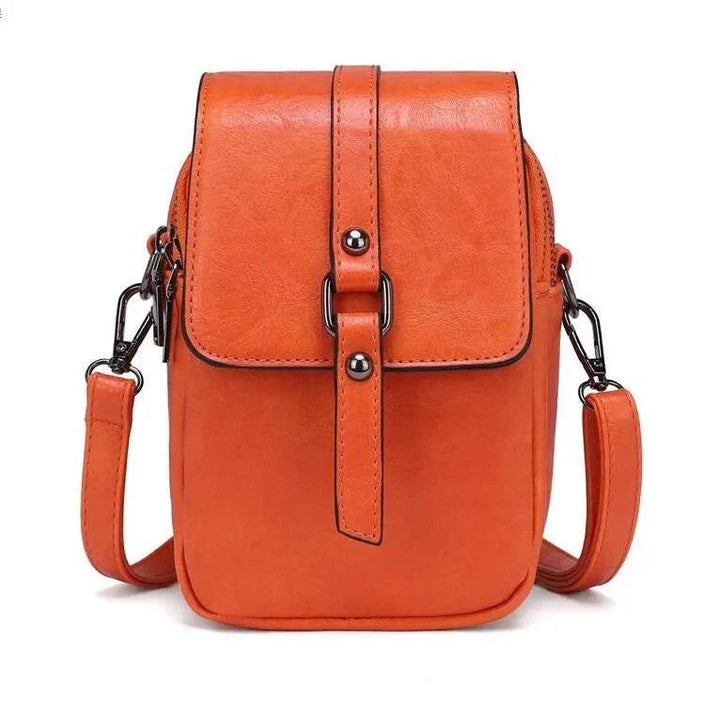Bossa de mà vintage de cuir suau amb estil